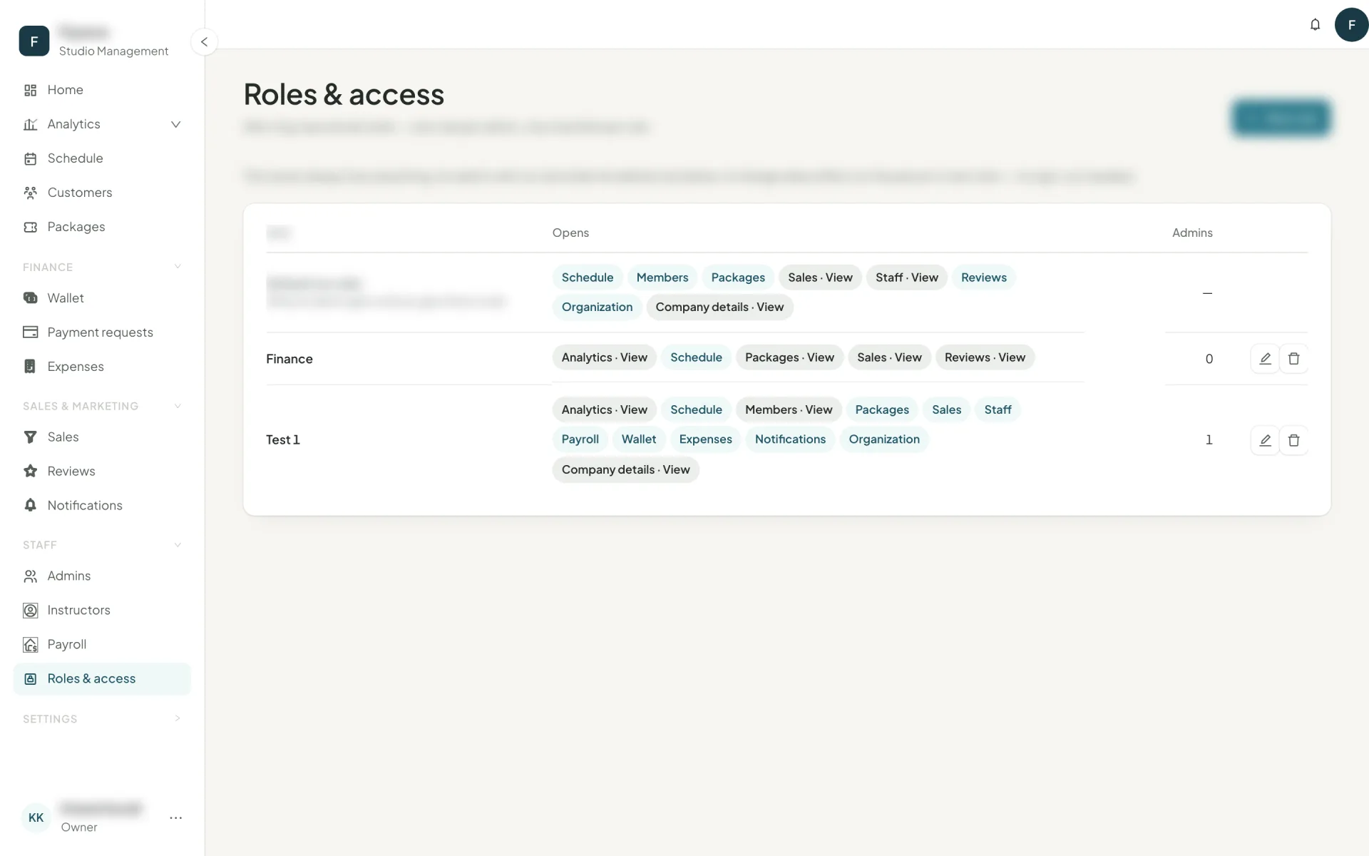 The Roles and access page listing each role, the modules it opens and how many admins hold it
